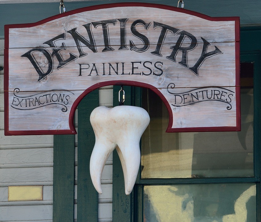 old dental practice sign